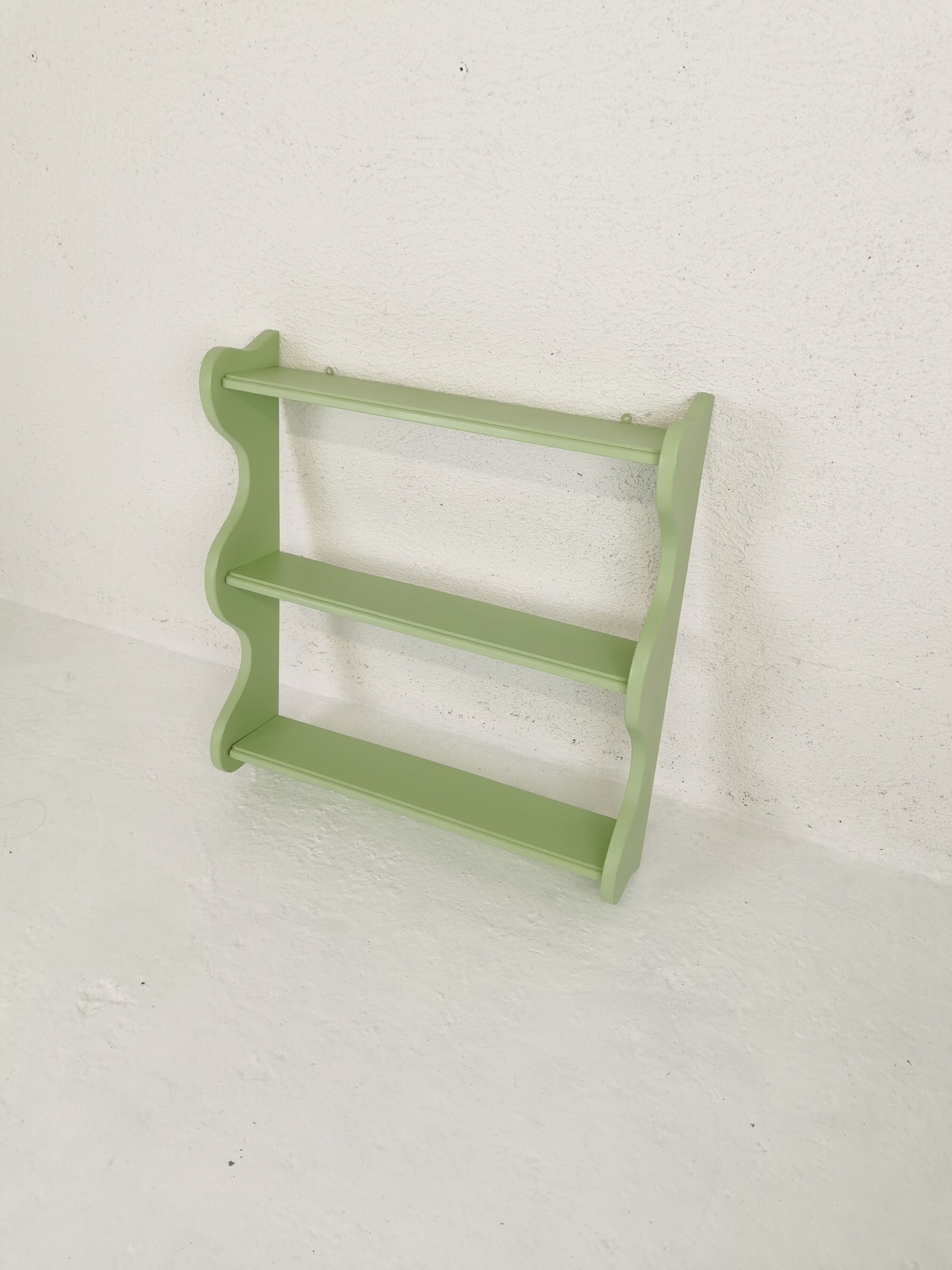 Corrugated wall shelf