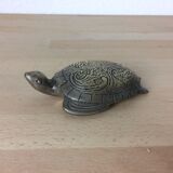 Turtle brass paper press