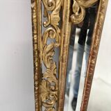 Miroir a pare closes de style Louis XIV en bois et stuc doré XIX siècle