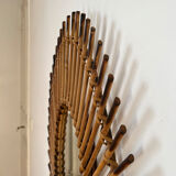 Rattan mirror in the shape of an eye