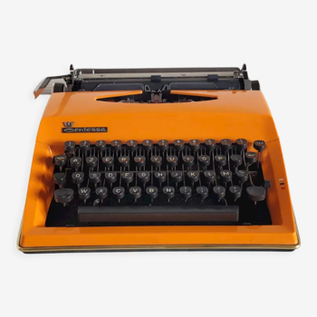 Vintage orange Triumph Adler Contessa typewriter