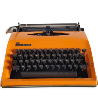 Vintage orange Triumph Adler Contessa typewriter