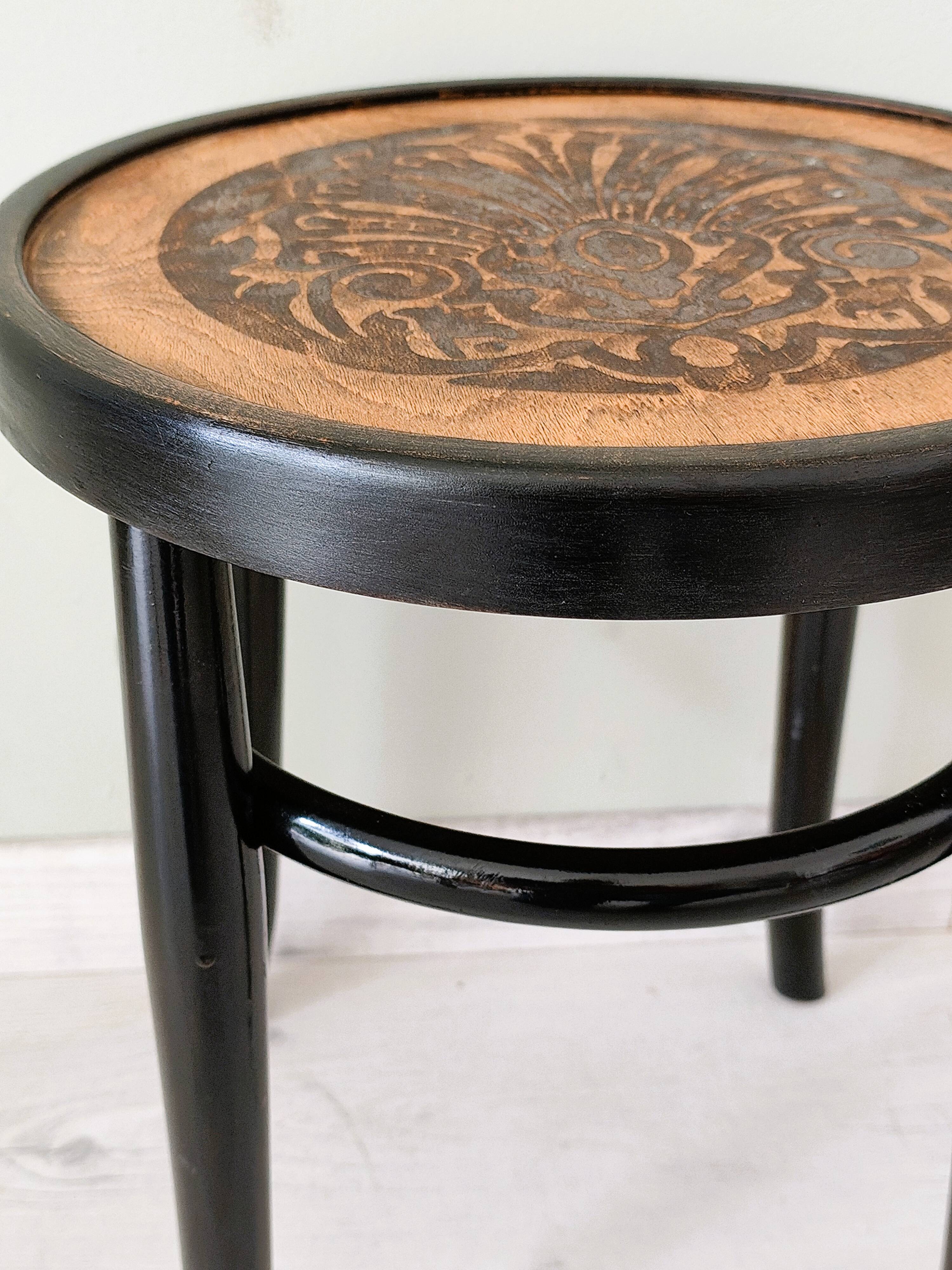 Stool in the style of Thonet made of solid wood.