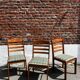 Lot of 3 vintage checkered wood and fabric chairs.