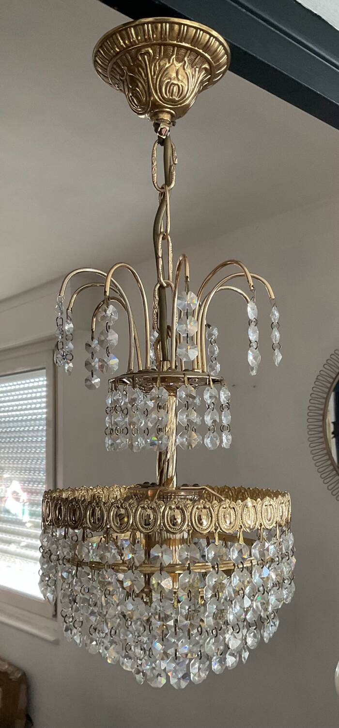 Cascade chandelier with crystal and brass tassels