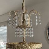 Cascade chandelier with crystal and brass tassels