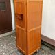 Old boarding school locker in golden oak