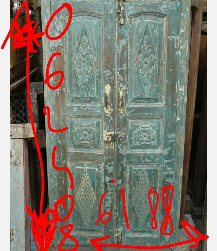 Old antique Indian door from Rajasthan made of old teak wood - functional