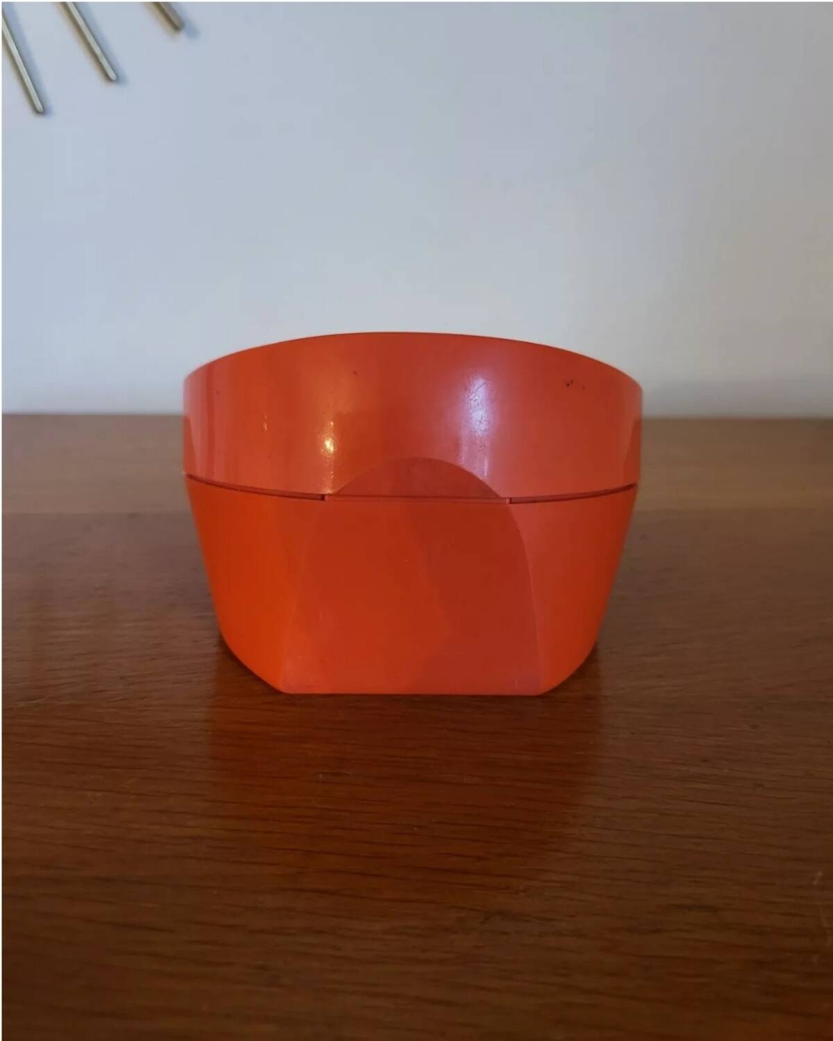 Vintage mechanical alarm clock in orange plastic Uti West Germany