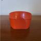Vintage mechanical alarm clock in orange plastic Uti West Germany