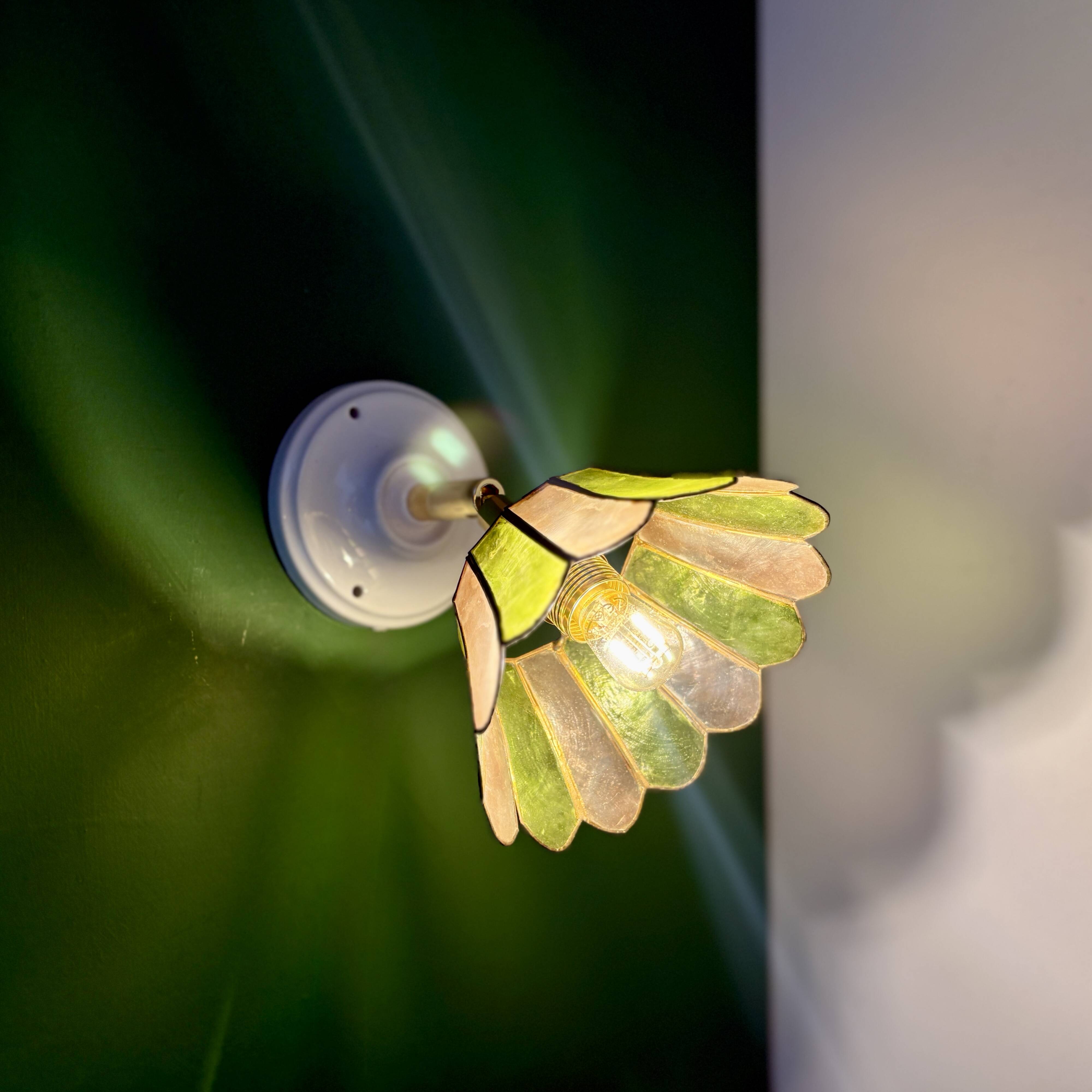 Vintage wall lamp with a green and pink mother-of-pearl lampshade