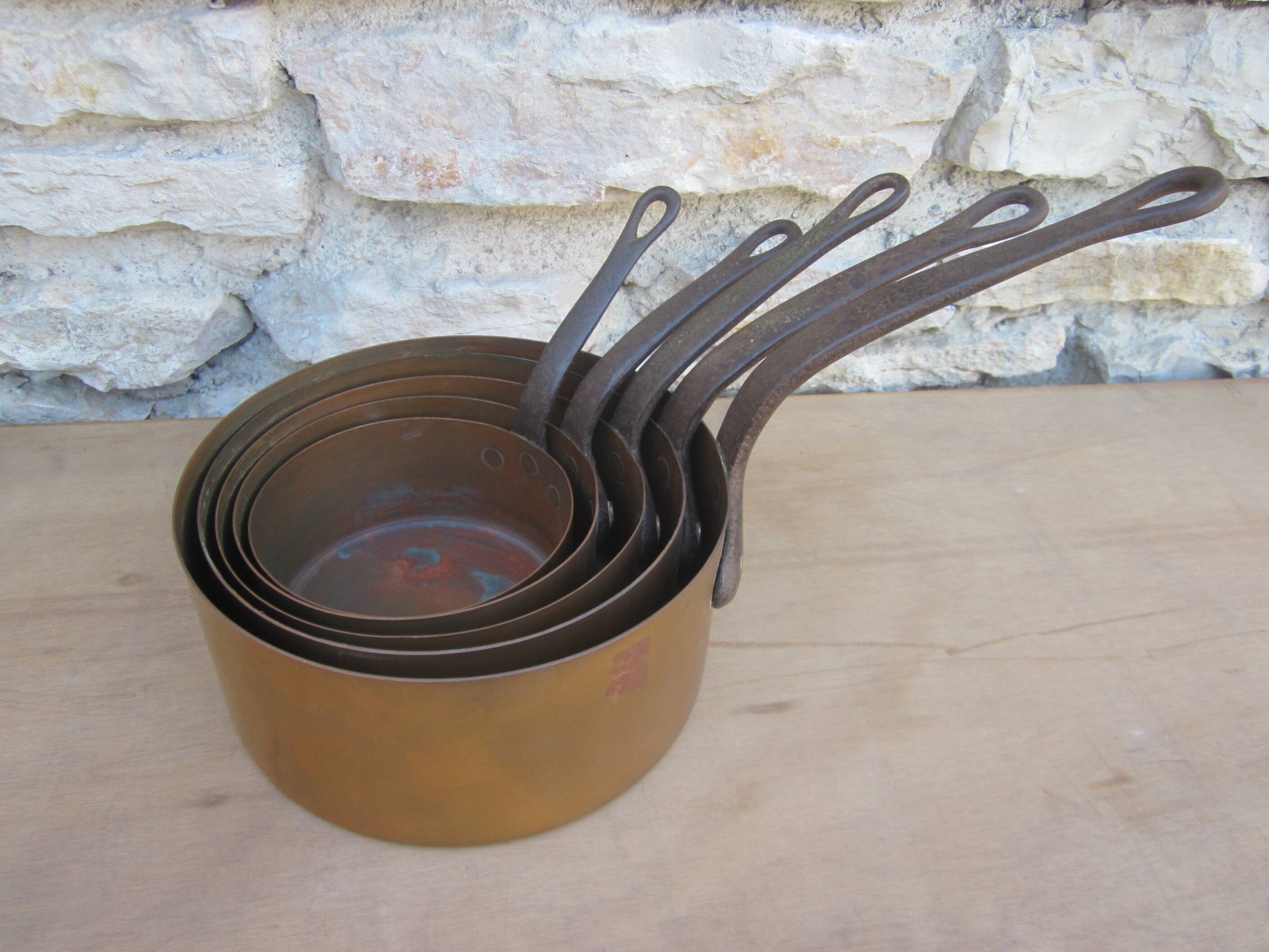 Set of 5 copper saucepans