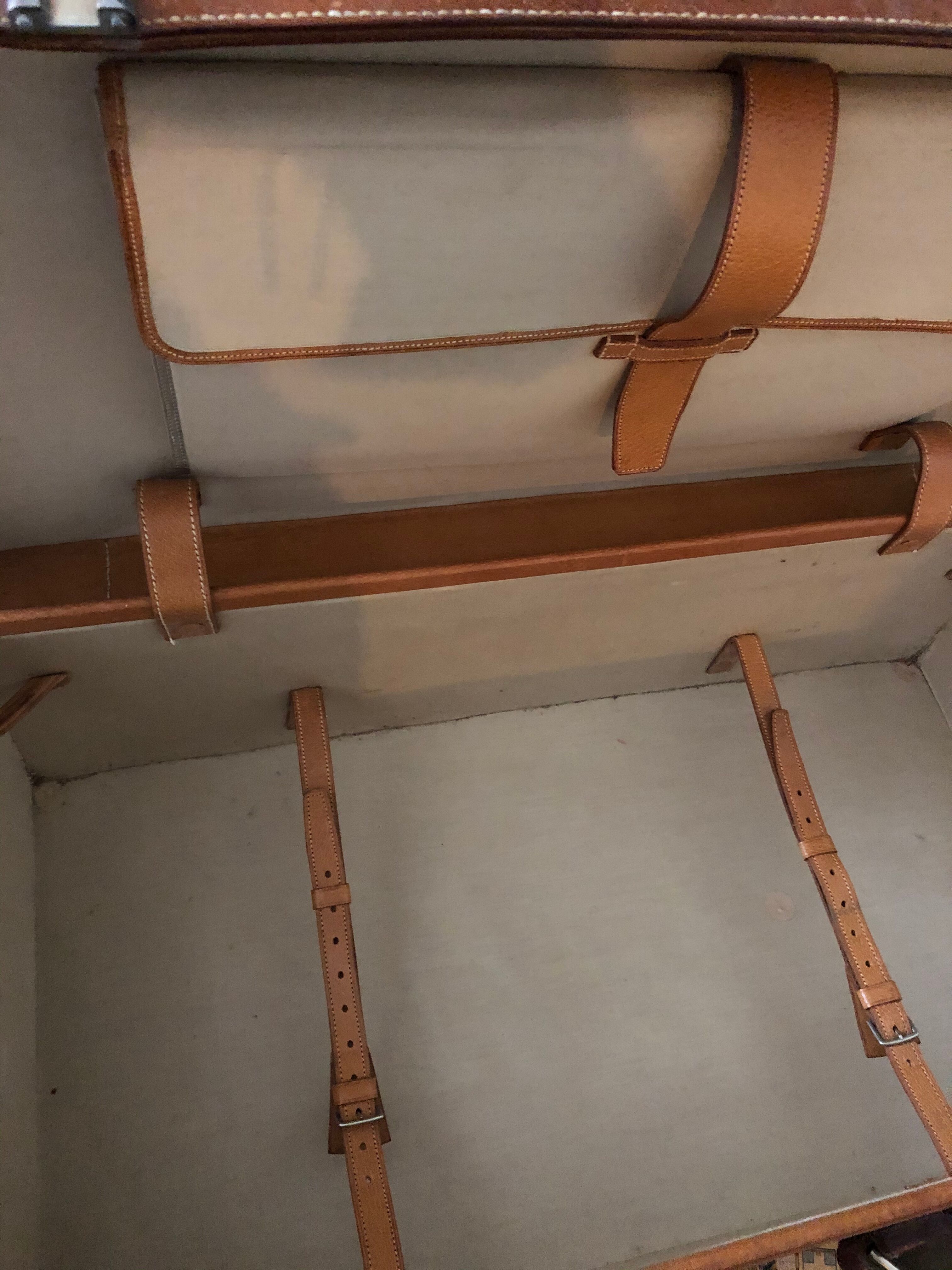 Former leather trunk with Louis Vuitton label holder