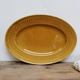 Serving dish in mustard gien earthenware