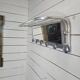 Aluminum wall coat rack with pivoting mirror from the 60s