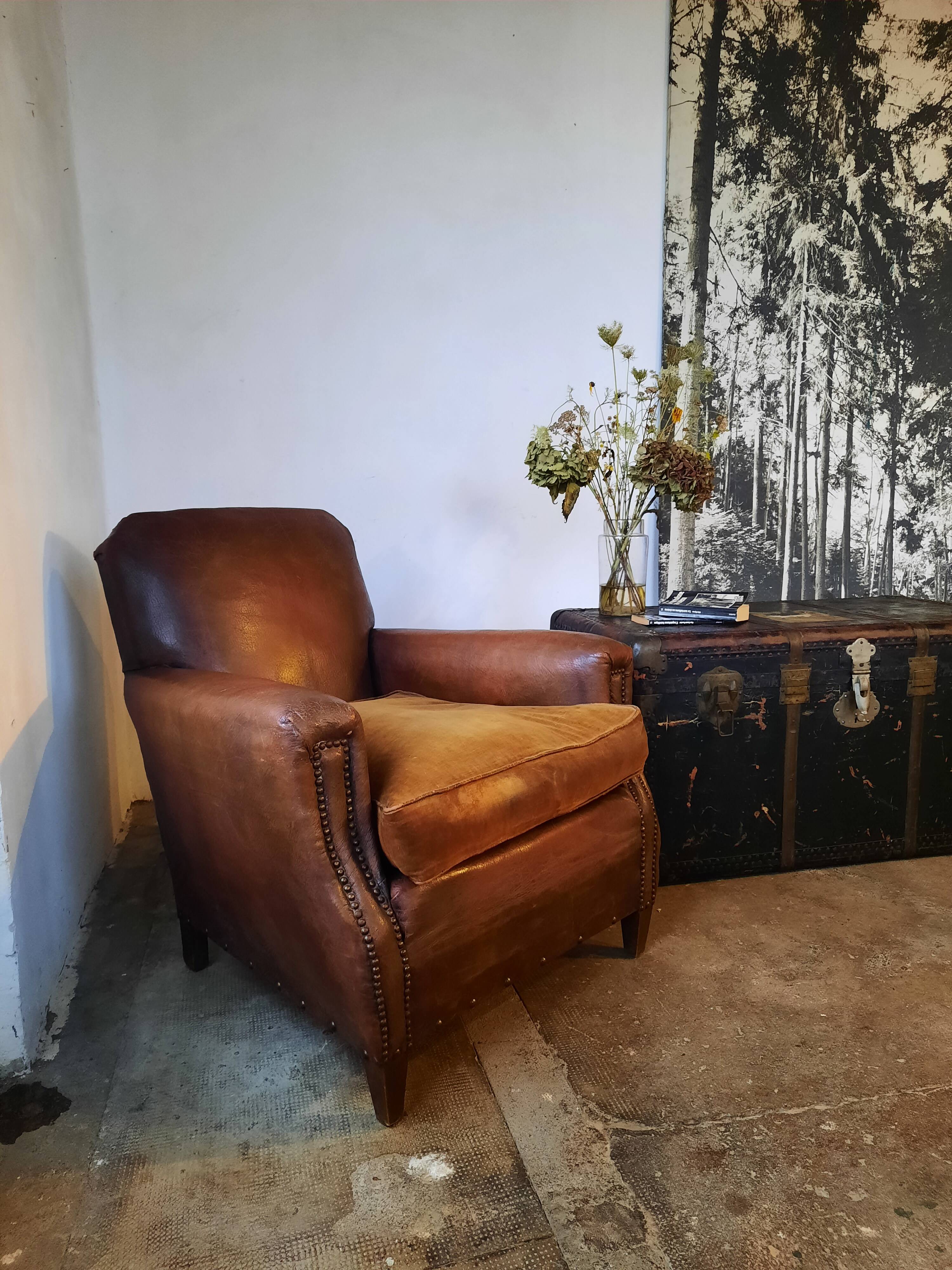 Old studded leather club chair 1930-1930