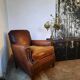 Old studded leather club chair 1930-1930