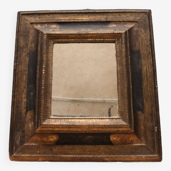 Miroir ancien en bois doré