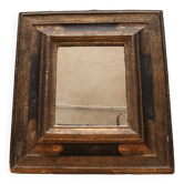 Old mirror in gilded wood