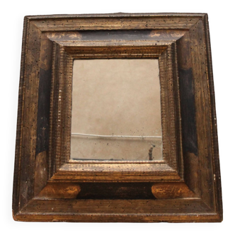 Miroir ancien en bois doré