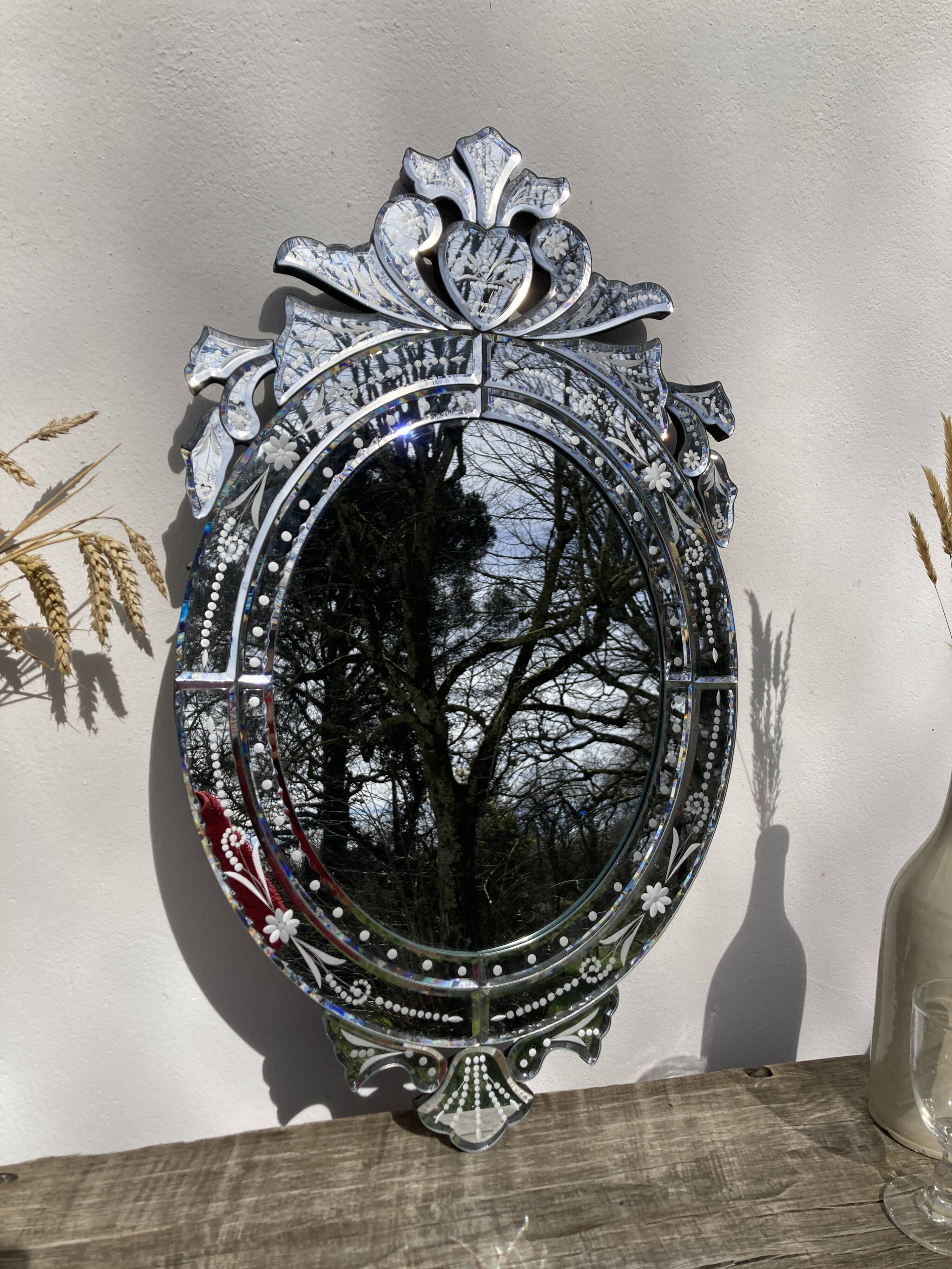 Oval Venetian wall mirror