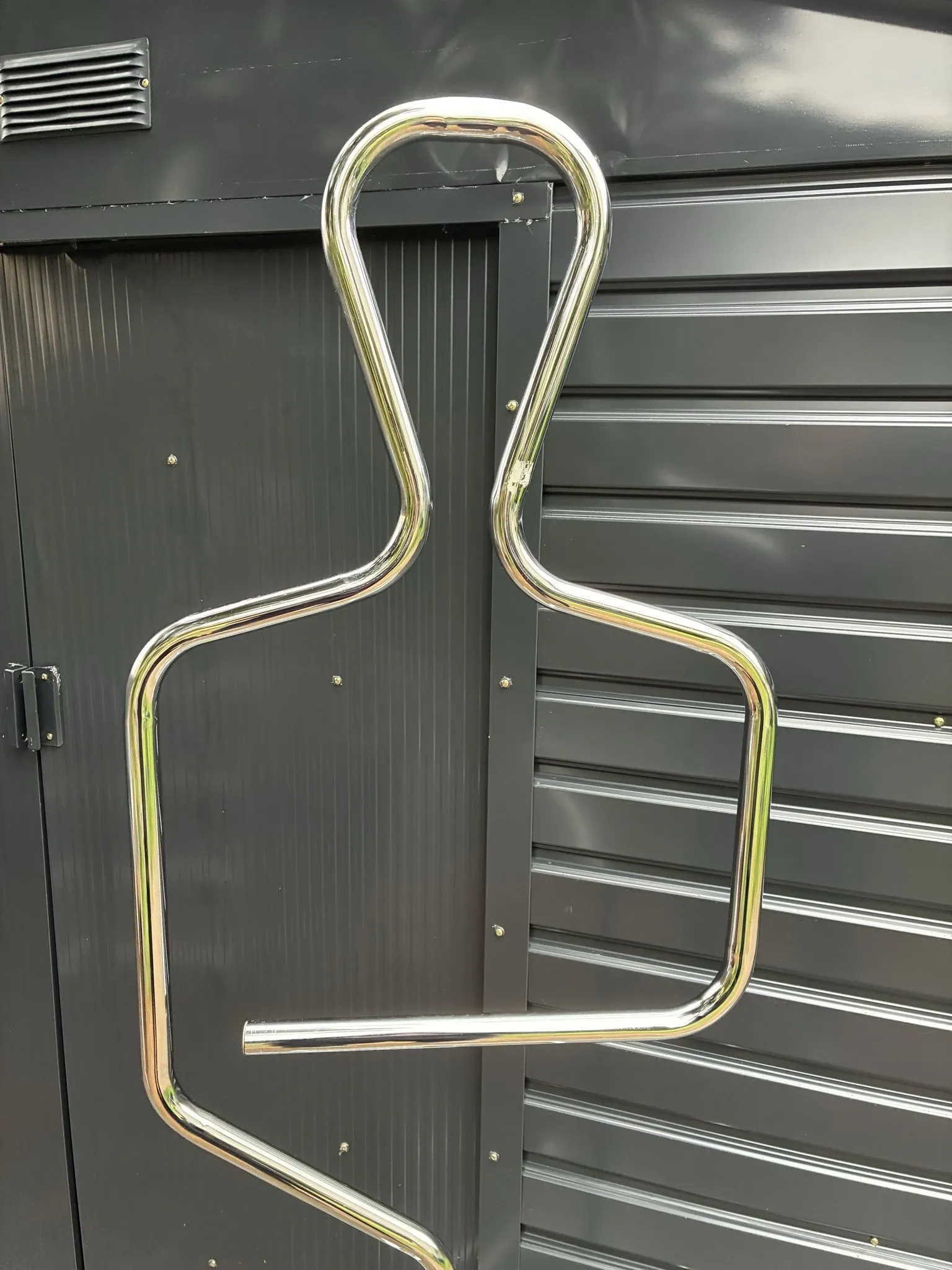 Chrome tubular valet stand in a human silhouette shape, 1980s