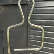 Chrome tubular valet stand in a human silhouette shape, 1980s