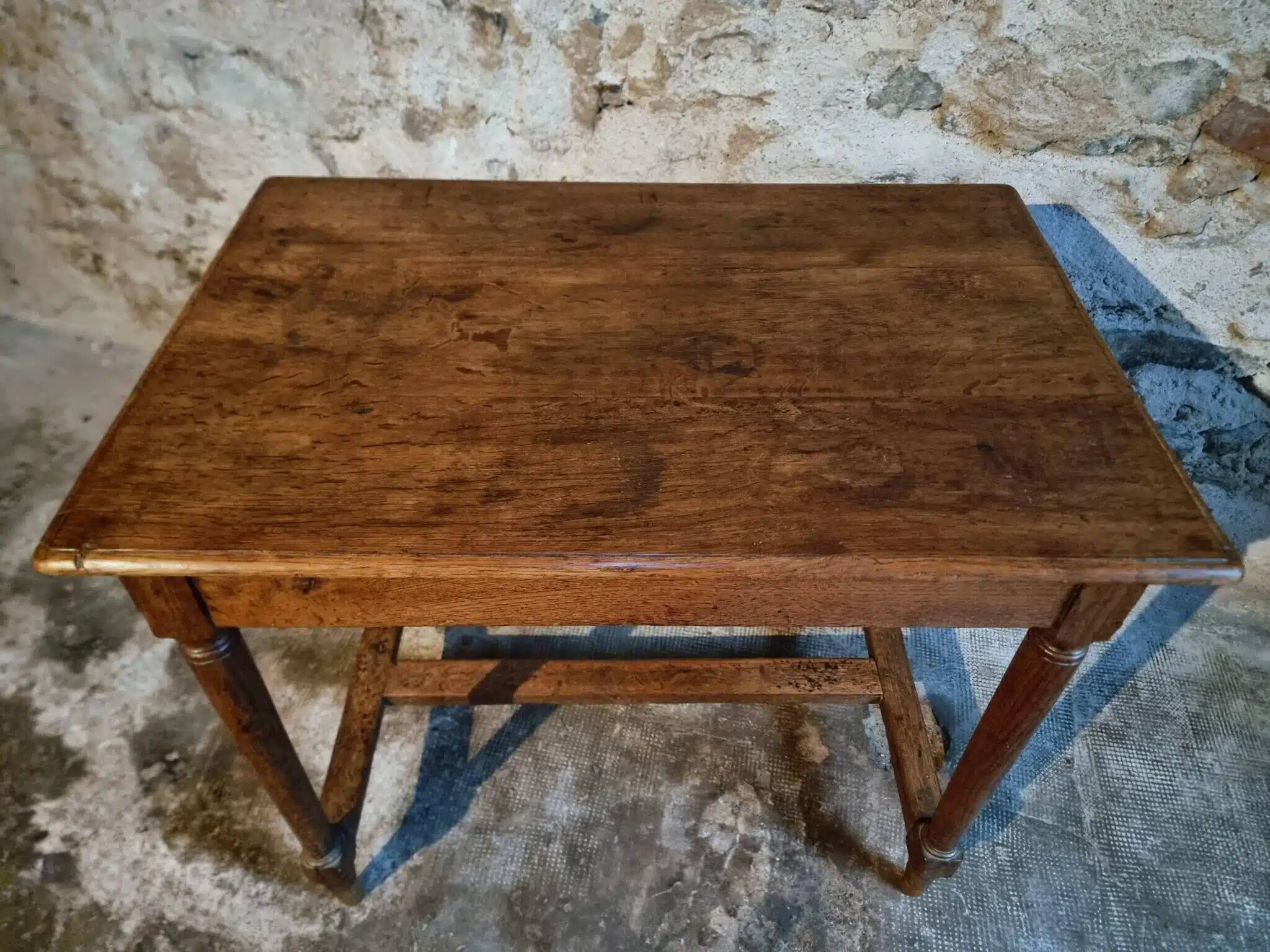 Antique French oak table, writing table from the early 19th century.