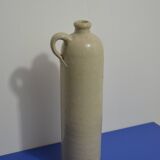 Stoneware bottle with handle