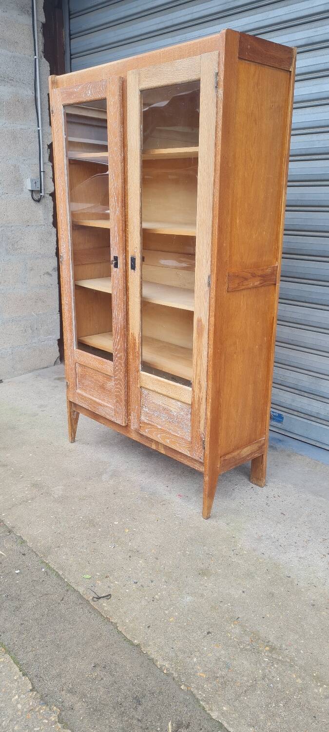 Armoire pied compas en chêne blond