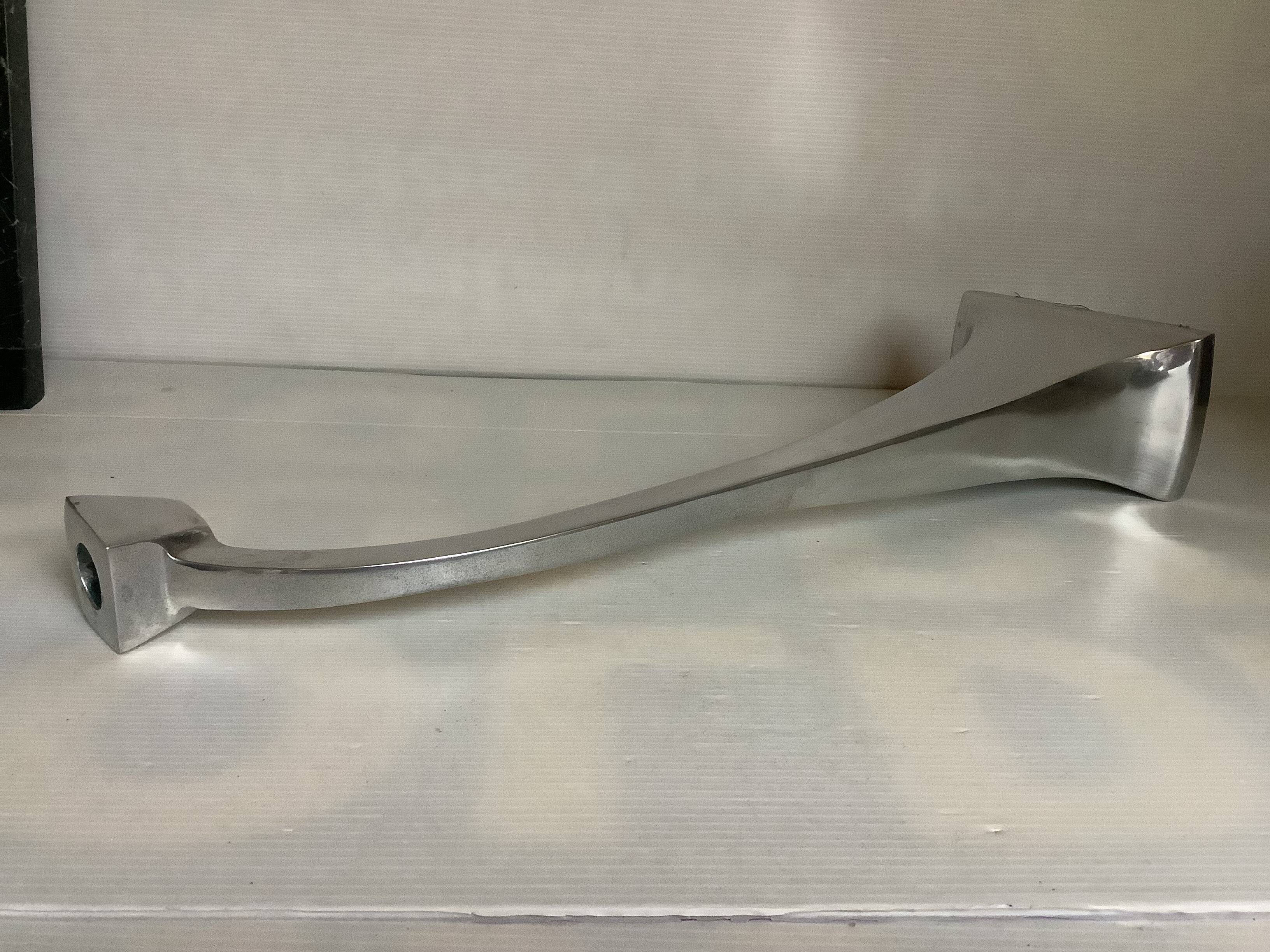 Large silver metal candlestick in the style of Xavier Lust