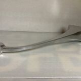 Large silver metal candlestick in the style of Xavier Lust