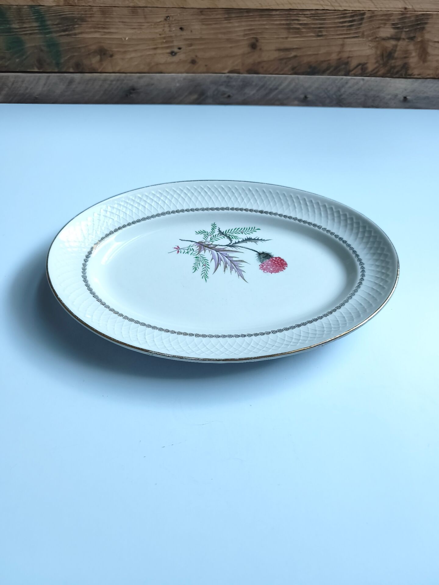 Vintage oval plate signed Moulin des Loups model Imperia pink flower