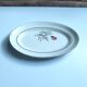 Vintage oval plate signed Moulin des Loups model Imperia pink flower