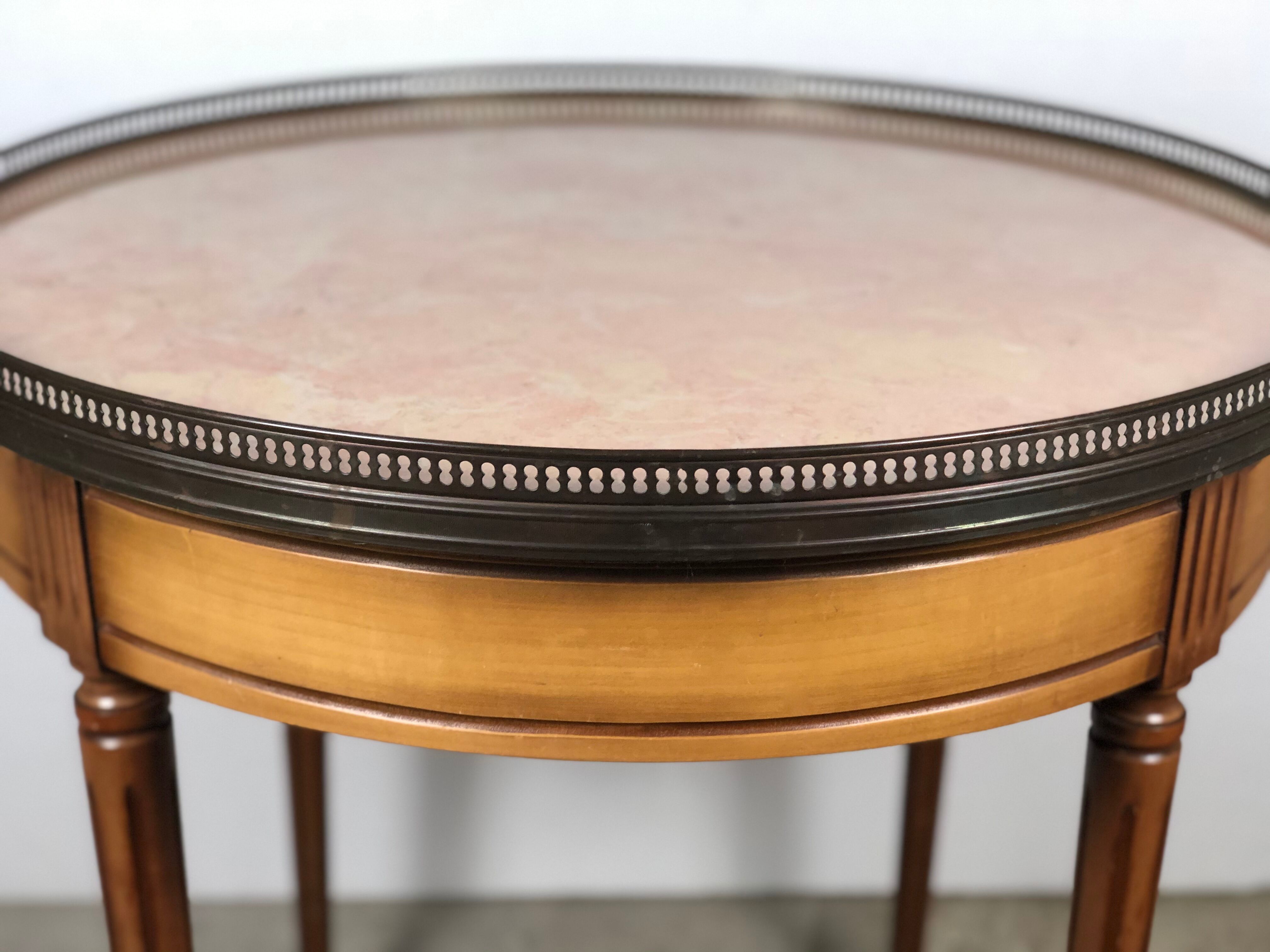 Louis XVI-style kettle table in cherry veneer with salmon marble top