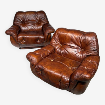 Pair of brown Skai armchairs