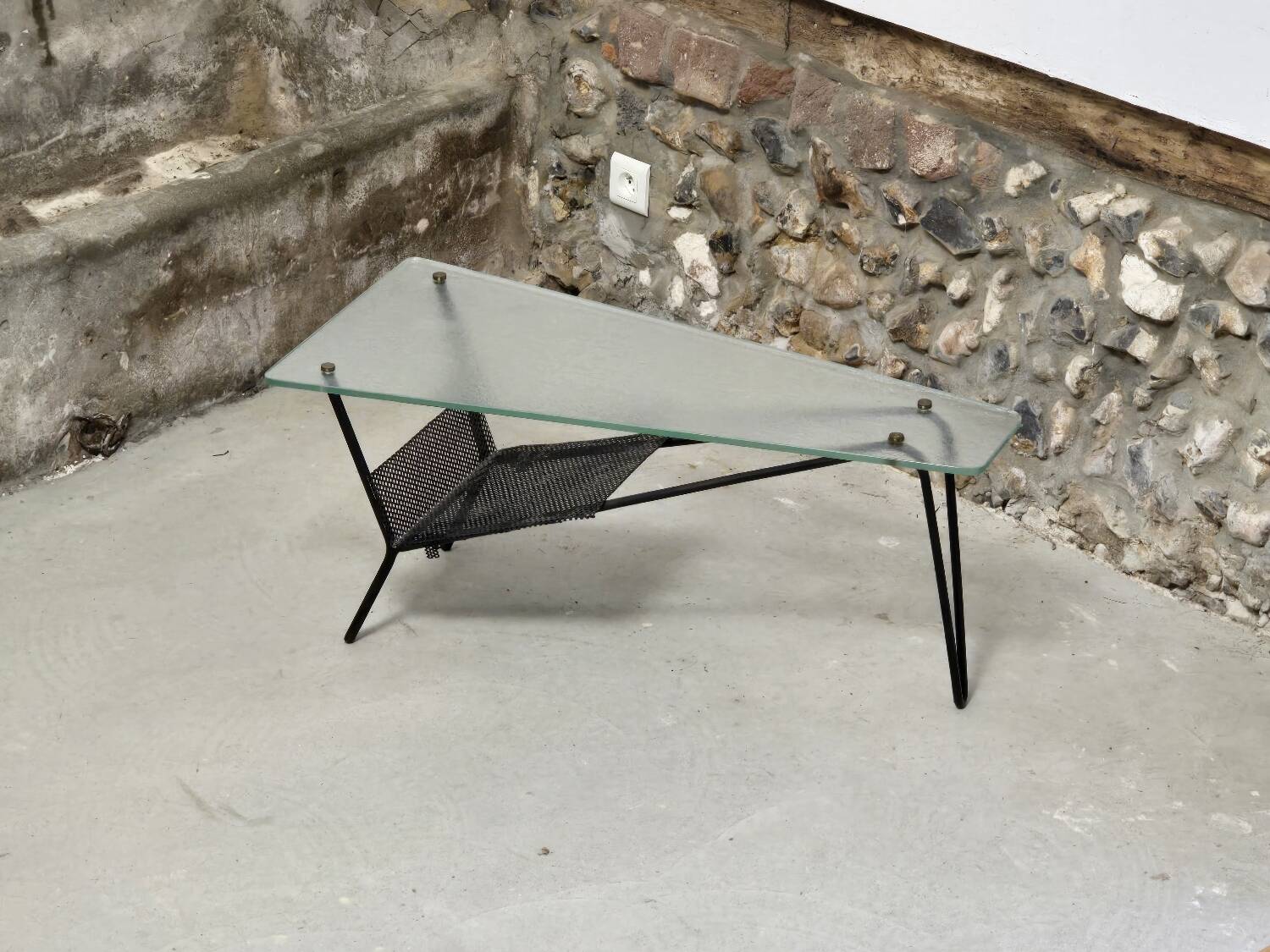 Coffee table in glass and black lacquered metal