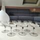 Set of 6 Baccarat-style champagne glasses. Stylized grape cluster decoration.