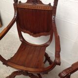 Paire de fauteuils anciens curules dit Dagobert en bois sculpté