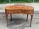 Console lady's desk in walnut burl from the early 20th century.