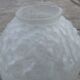 Art Deco ball vase pair with flower and leaf decor