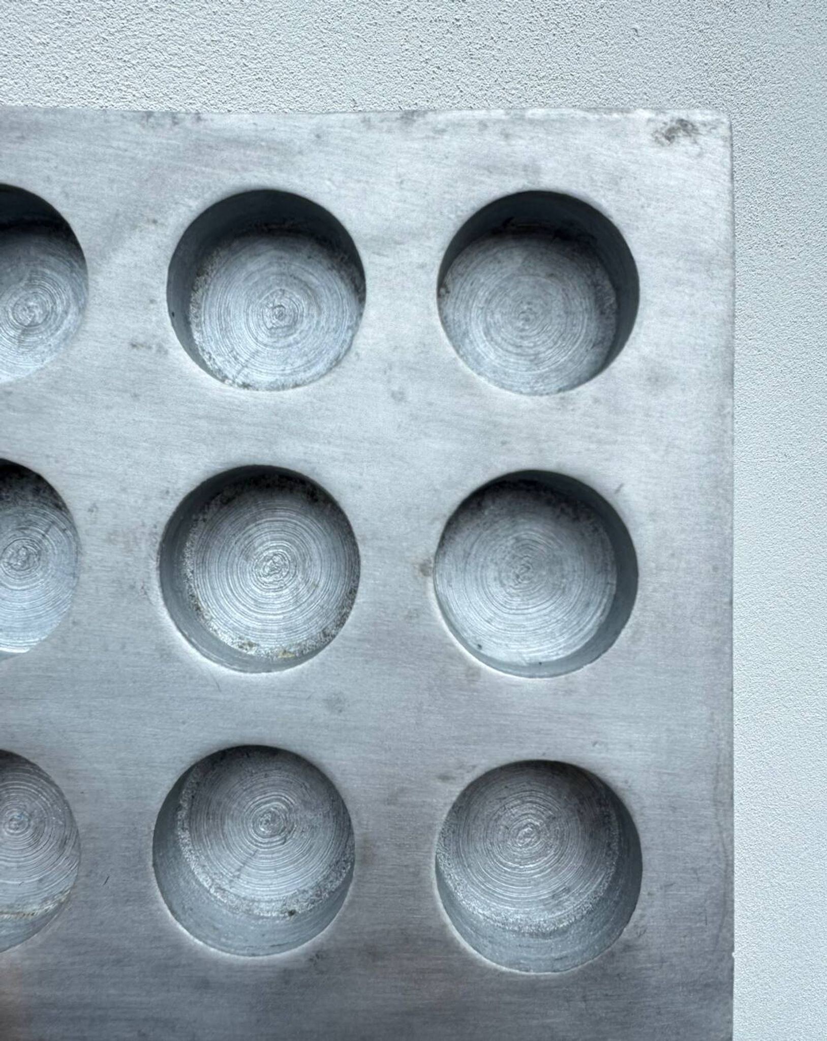 Brutalist style brushed aluminum candle holder