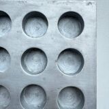 Brutalist style brushed aluminum candle holder