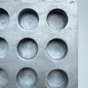 Brutalist style brushed aluminum candle holder