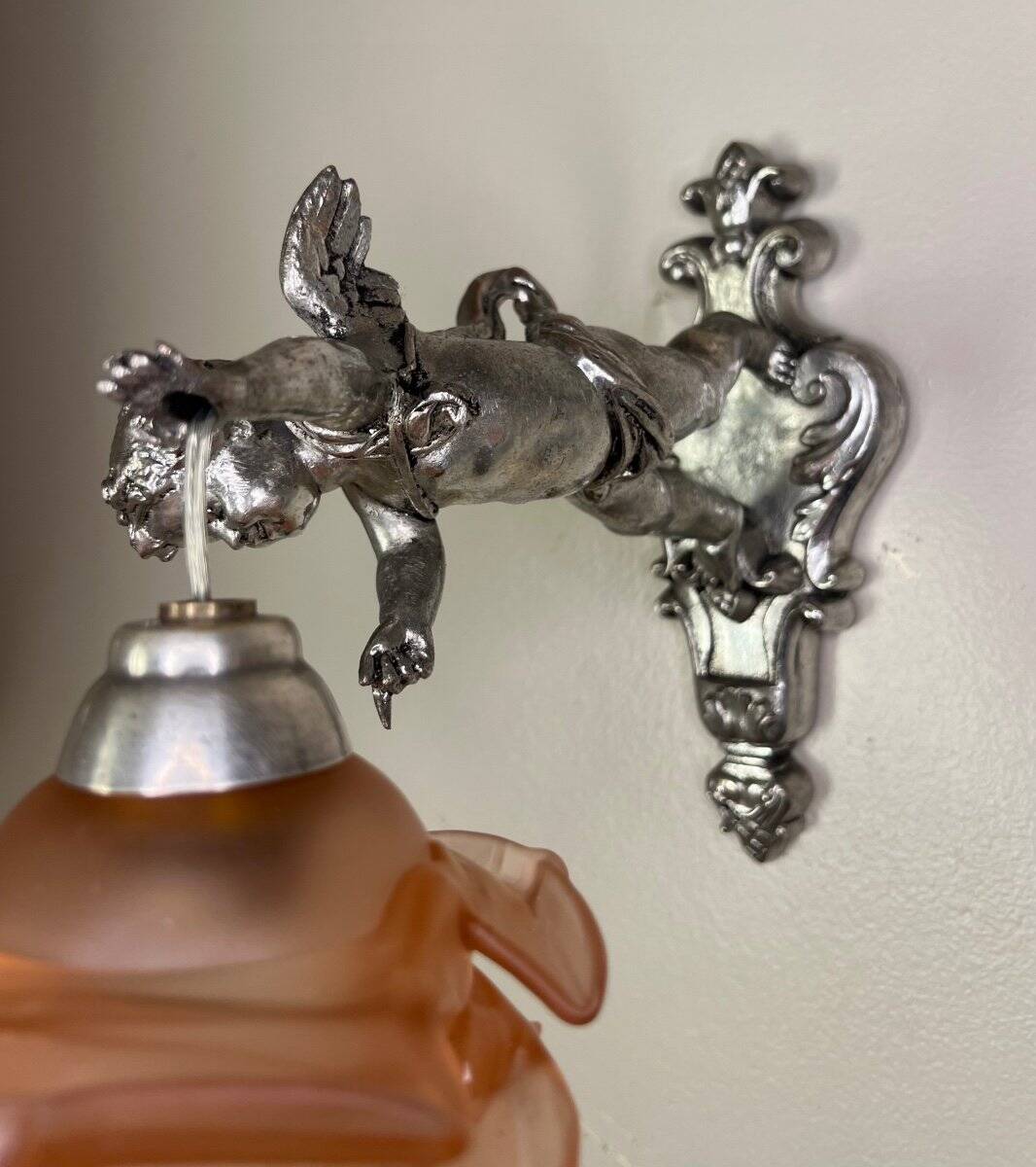 Pair of wall sconces, cherubs, angels, silvered