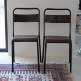 Pair of patinated metal chairs