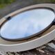 Miroir rond éclairant en plastique années 70