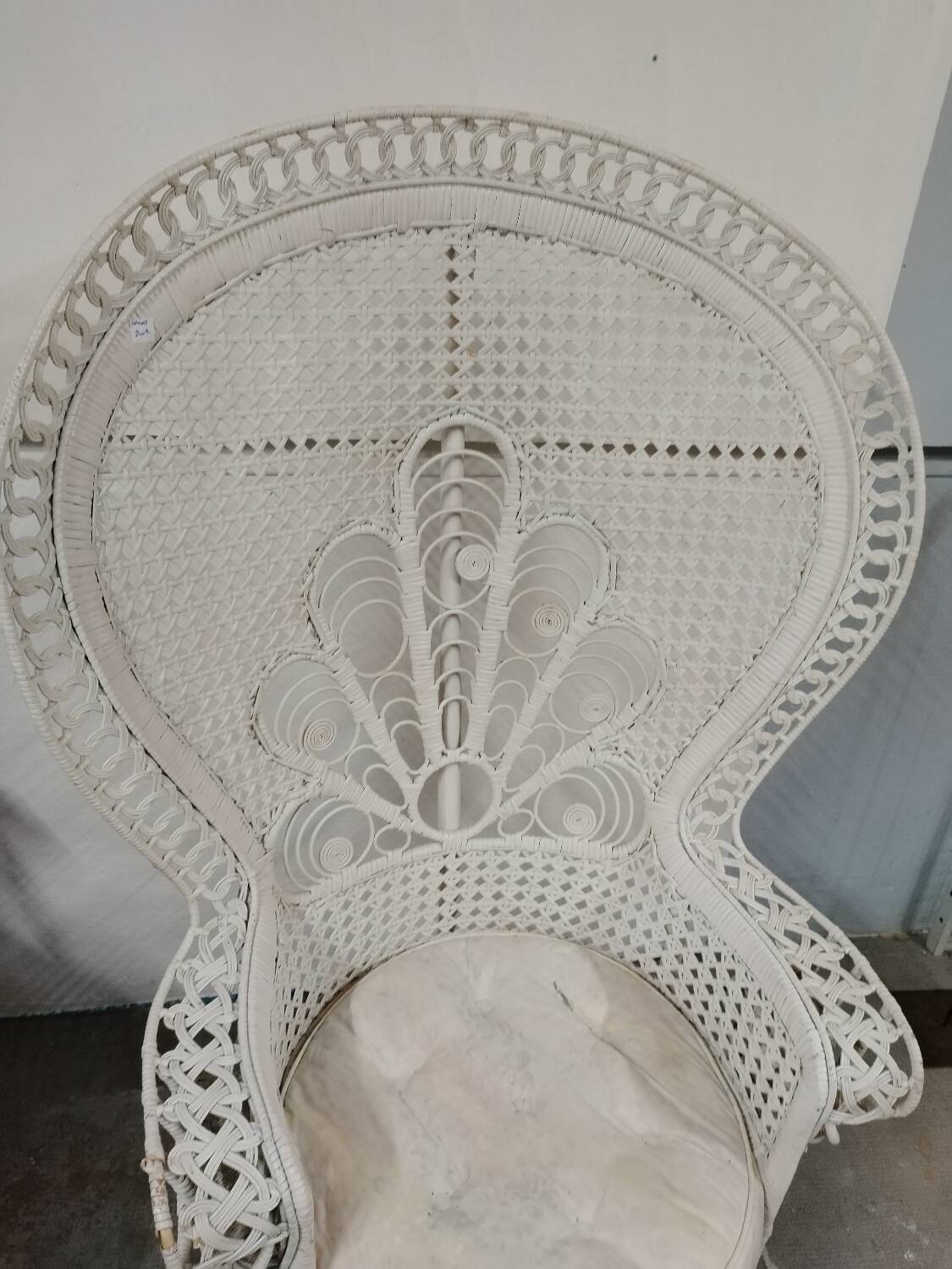 White wicker armchair