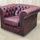 Chesterfield armchair in red leather from the 1980s