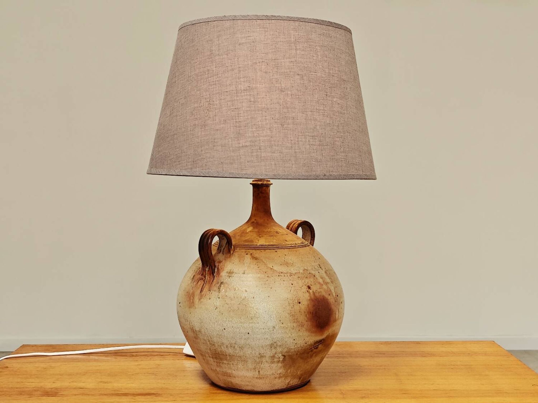 Modernist ceramic sandstone lamp with two handles from the 1950s